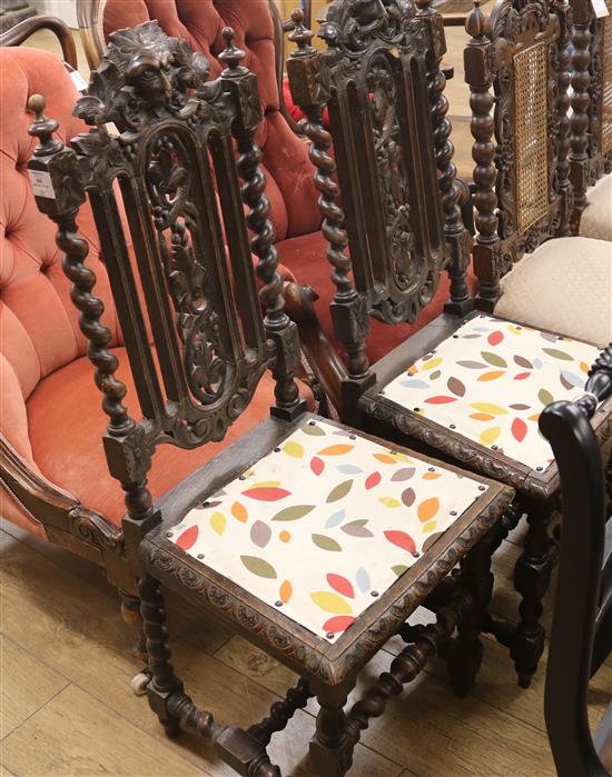 A pair of carved oak hall chairs